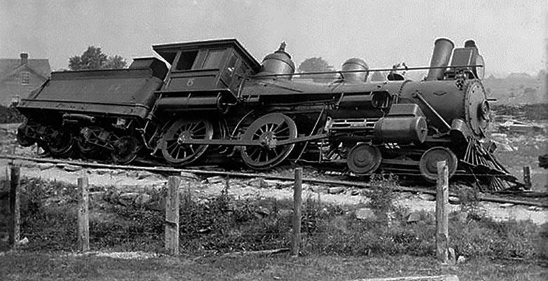 "Derailed locomotive of the artillery train accident at Enterprise, Ontario, June 9th, 1903" by Century 21 Champ Realty -Bill Stevenson is licensed with CC BY-NC-SA 2.0. To view a copy of this license, visit https://creativecommons.org/licenses/by-nc-sa/2.0/